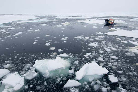 The Oden's small boat, Hugin, navigates around ice floes prior to an AUV deployment.